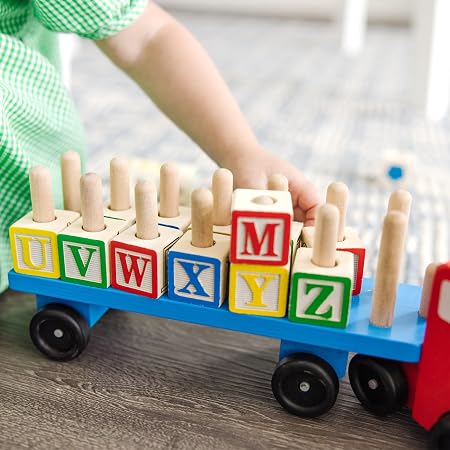 Melissa & Doug: Wooden Alphabet Truck - 28 pieces Melissa & Doug - أحجية أرضية قطار الأبجدية - 28 قطعة